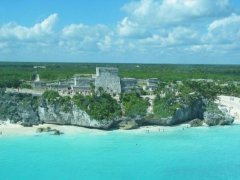 An aerial view of Tulum taken from the sea.